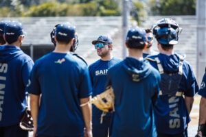 Coach Milam and his team dial it in before their home opener on June 6.
